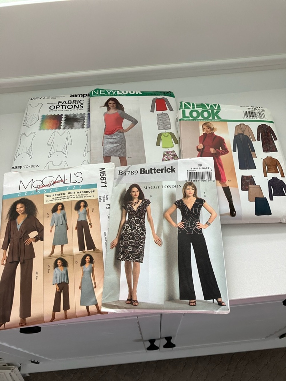 Five Sewing Patterns Uncut sz 4–24, stretch knit